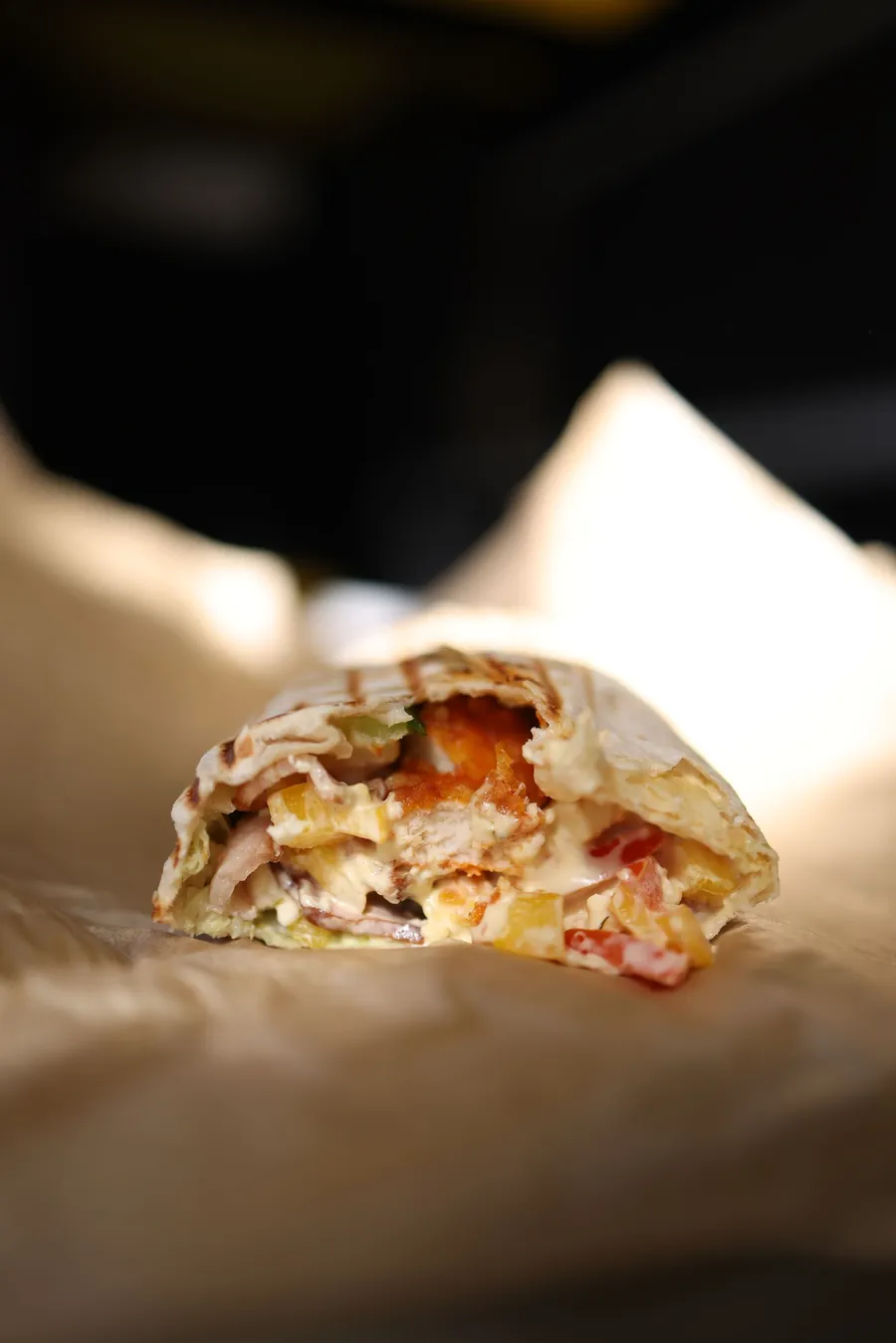 A shawarma platter with rice, salad and sauces